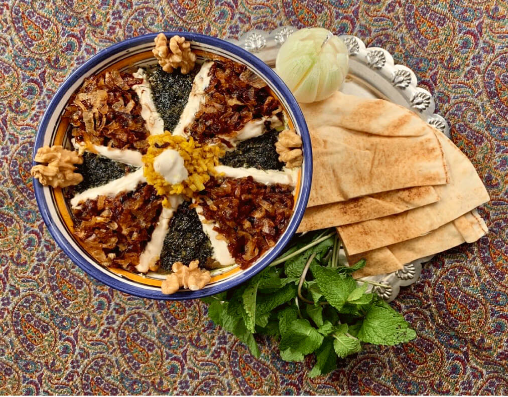 Kashk-e Bademjan served with walnuts, mint and flatbread